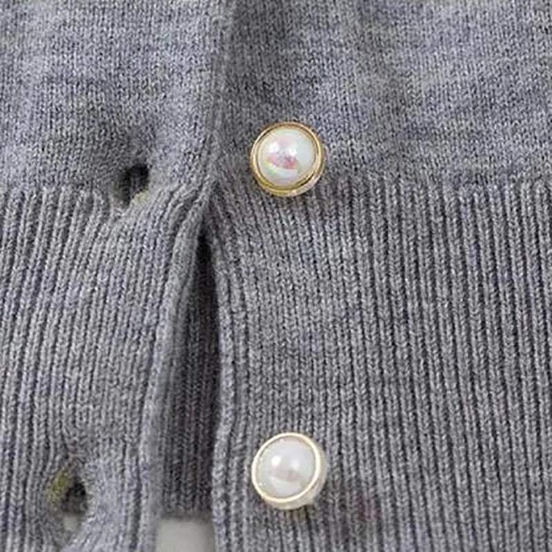 Cardigan élégant et chic avec boutons de perle