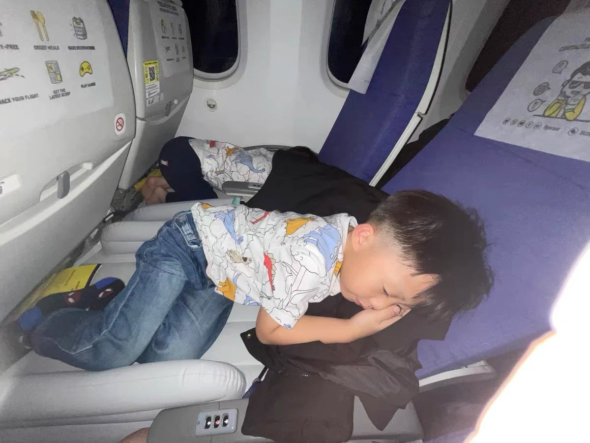 Coussin gonflable repose pied pour avion - Bandeau yeux et boules quies OFFERTS