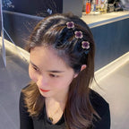 Barrette à trois fleurs pinces