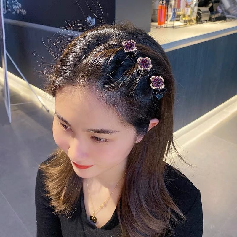 Barrette à trois fleurs pinces