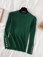 Pull col rond avec boutons dorés aux manches