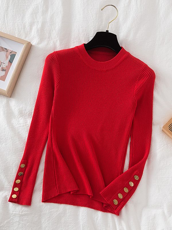 Pull col rond avec boutons dorés aux manches