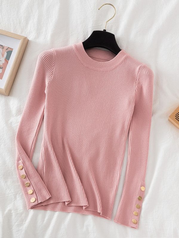 Pull col rond avec boutons dorés aux manches
